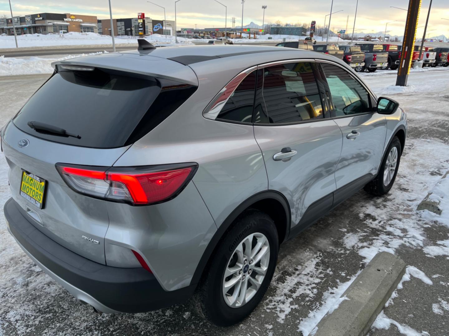 2022 Silver /charcoal cloth Ford Escape SE AWD (1FMCU9G67NU) with an 1.5L L3 engine, 6A transmission, located at 1960 Industrial Drive, Wasilla, 99654, (907) 274-2277, 61.573475, -149.400146 - Photo#4